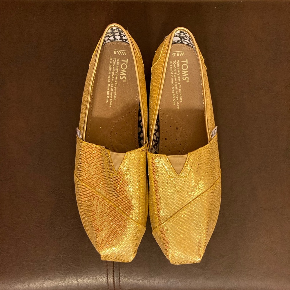Never worn ⭐️ gold glitter Tom’s